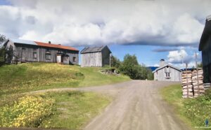 Inderdalen Gård i Brygfjelldalen. Gammelt langt våningshus og to uthus.